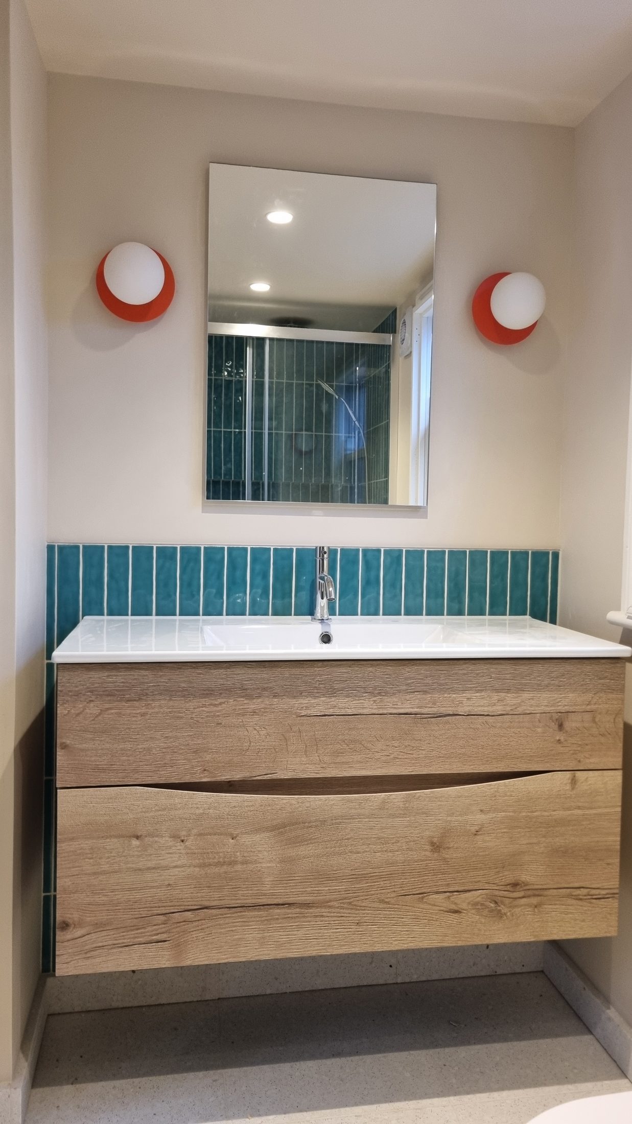 Belgrave Road — A family bathroom in deep teal.