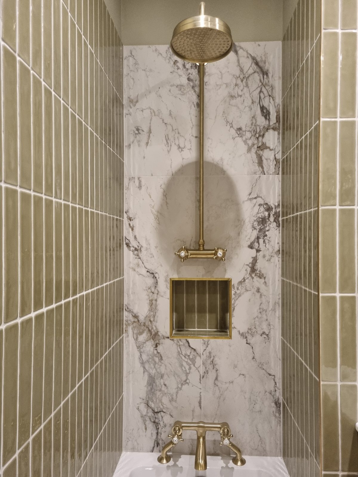 Bath, with brass tap.